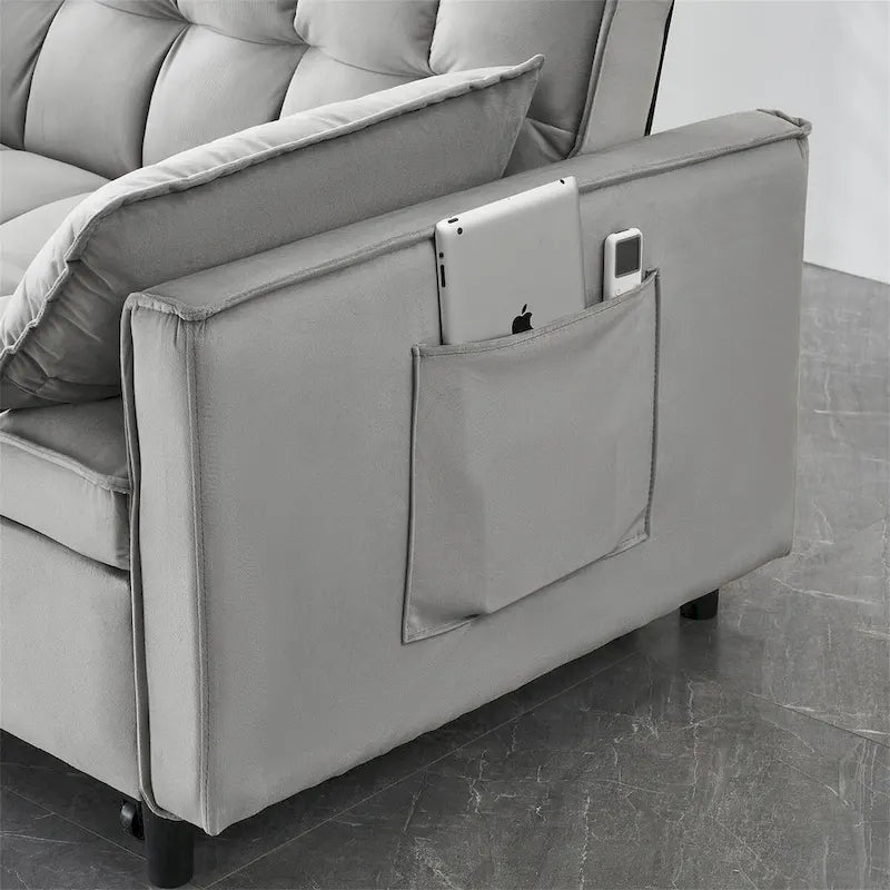 Canapé deux places en velours avec dossier inclinable, coussins décoratifs et poches